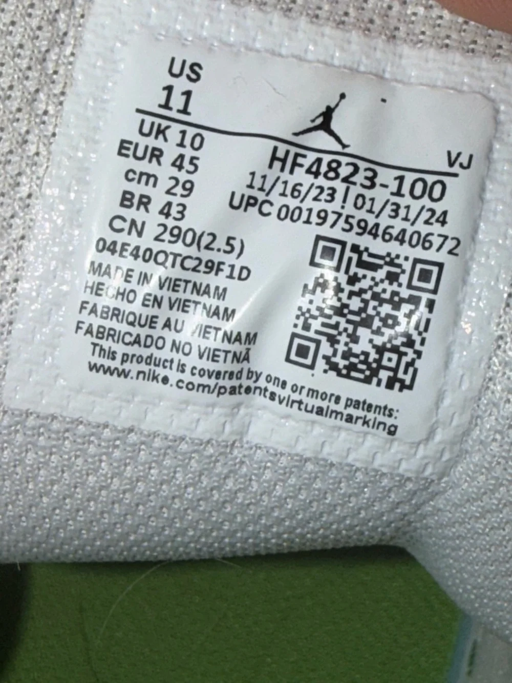 Nike Jordan 1  SE White and Green Low-Top Sneakers with Yellow Logo
